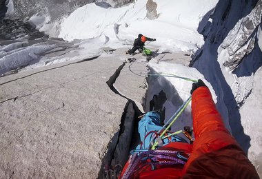 David Lama looking down to Conrad Anker on their expedition to the unclimbed Lunag Ri (6907m) in the Himalayas of Nepal on November 24, 2015. (c) Servus TV / Mammut / Red Bull Content Pool