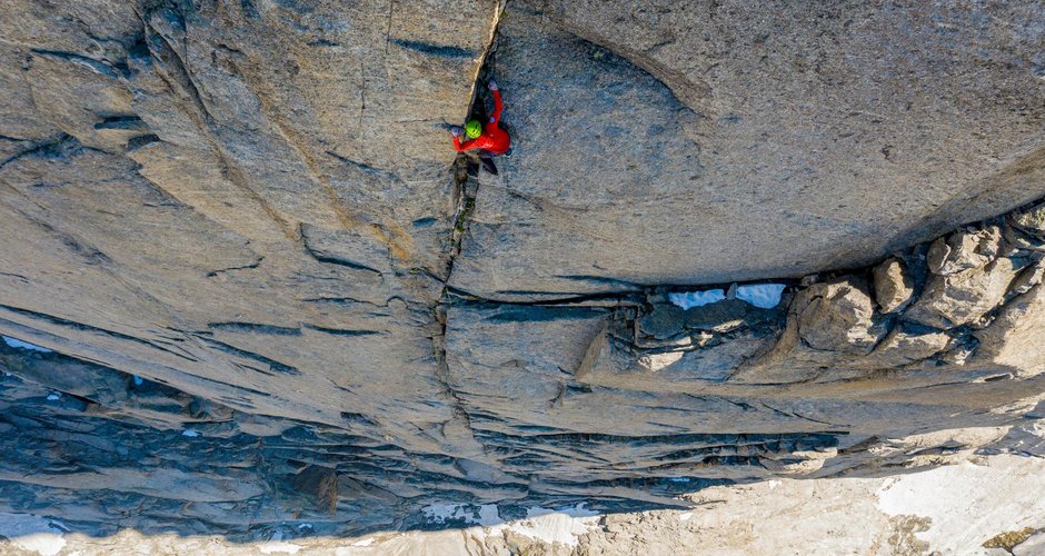 Alex Honnold soloing high up on the American Direct on Les Drus, Chamonix (c) Renan Ozturk / Red Bull Content Pool